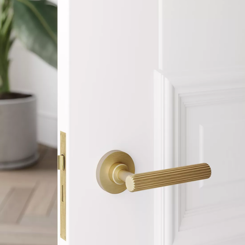 Paire de poignées de portes Dorique Laiton